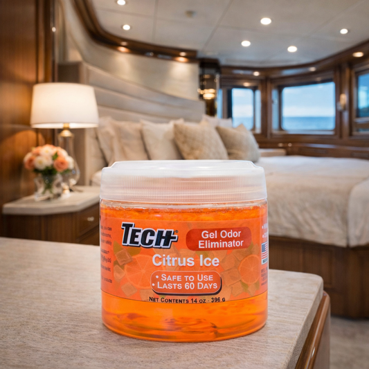 TECH Gel Odor Eliminator Citrus Ice on a table with in a luxurious yacht bedroom in the background