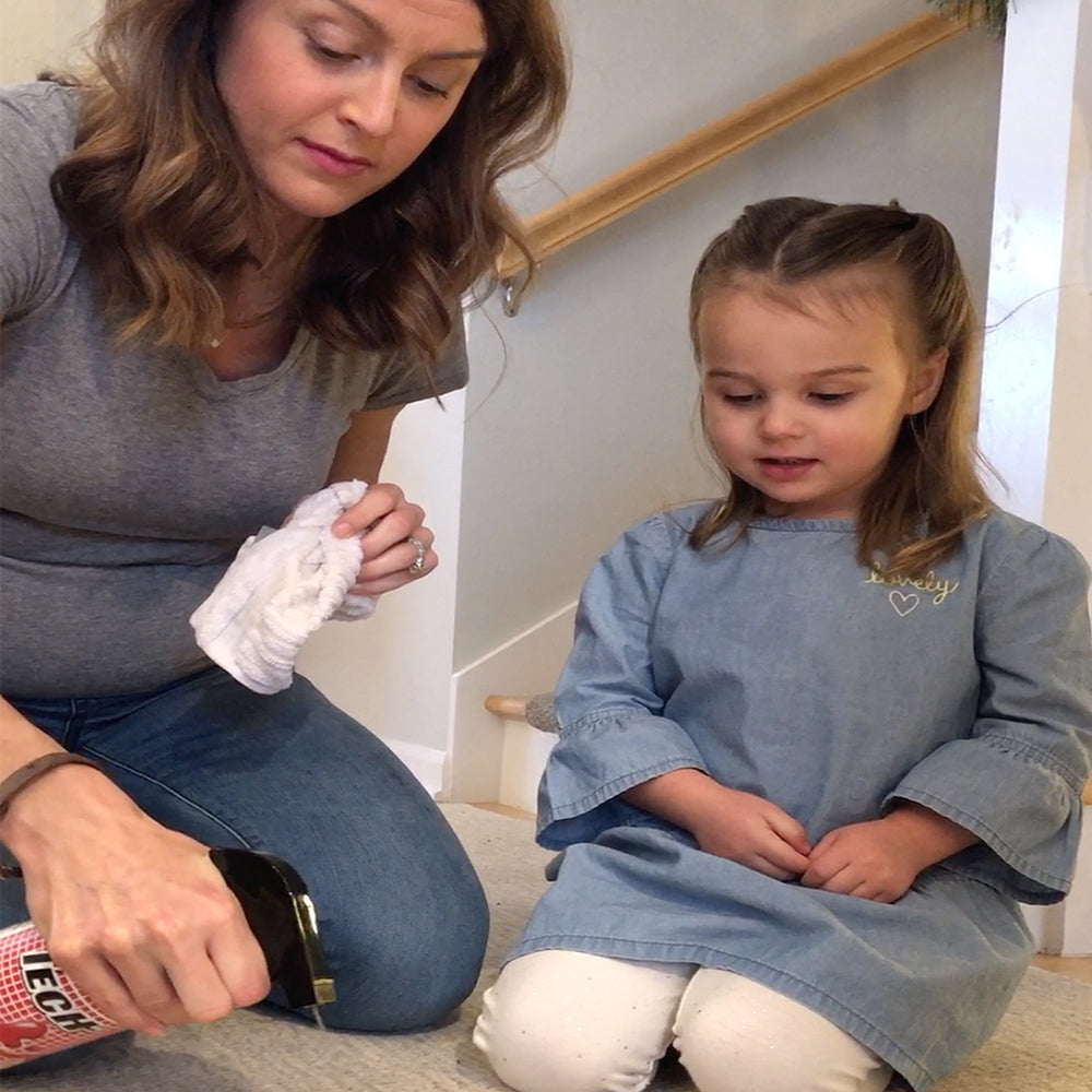 Woman and Child Using TECH Stain Remover